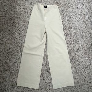 Elastic waist cream wide leg pant.